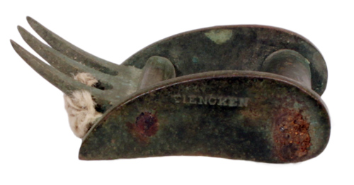 A tourniquet buckle that would have been used to keep a bandage tight to stem bleeding.